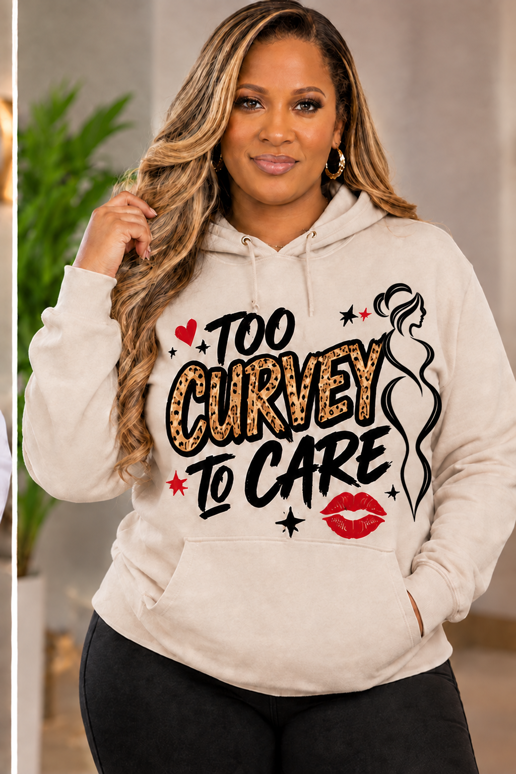 Beige hoodie with black silhouette logo on the right